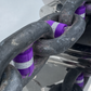 Close up of purple stud link chain markers fitted to anchor chain